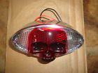 11779 11201 11827 Mid Usa Custom Chopper Bobber Builders Cat Eye Taillight W Red Skull 3d Lense Clear