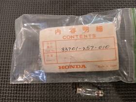 33701-257-000 Honda Nos Tail Light Bulb 6v6/4w Cb95 Ca95 Cs92 C95 Ca92 Cb92 Oem