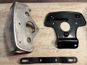 82-9327 Triumph F9327 1969 1970 T150 Trident Alloy Tail Light Housing With Back Plate Look