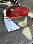 Daytec Taillight License Plate Frame Harley 9 Wide Fatbob Bobtail Episode Scene. Fixed Price $169.99.