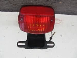1976 1977 Kawasaki KZ900 Combination Lamp Assy Part 23025-064. Fixed Price $60.00.