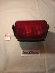 Triumph Used Tail Lamp Assy 2700070-T0301 #513. Fixed Price $70.00.
