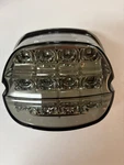 New Harley Davidson Taillight Smoked W/ License Plate Illumination 67800205. Fixed Price $140.00.