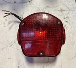 1974 Kawasaki KZ400 Tail Light Stanley. Fixed Price $45.00.