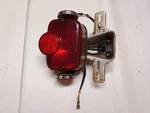 Suzuki RV125 Taillight With Bracket Fits 1972-1978. Fixed Price $48.00.