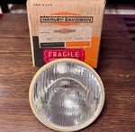 Harley Davidson Aermacchi Headlamp Headlight Bulb 67718-70P. Fixed Price $49.99.