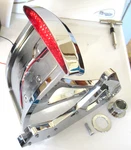 Chrome Left Rear Billet Brake Caliper/ Tail Light/ License Plate Bracket, Harley. Fixed Price $179.95.