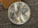 Omix 12409.04 Halogen Bulb Headlamp For 1965-2006 Jeep Cj/wrangler Sc. Fixed Price $17.49.
