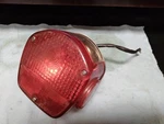 Oem Kawasaki KZ400 Tail Light Assembly 230271019. Fixed Price $20.00.