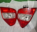 Tail Light Set For 2007-2008 Honda Fit Left And Right Red Lens Halogen Assembly. Fixed Price $100.99.