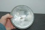 Nos Kawasaki 23007-059 Headlamp Unit Lens 74-79 KZ400 80-81 KZ440 81-82 KZ305. Fixed Price $130.00.