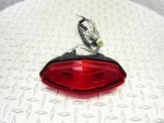2005 02-06 Suzuki DL1000K V-strom Rear Lamp Lens Oem. Fixed Price $23.20.