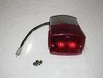 1990 Kawasaki Vulcan VN750 Taillight Lamp Assembly 23025-1116. Fixed Price $29.99.