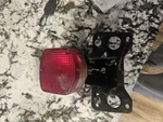 HM-17RC Tail Light Assembly Honda 1976-1977. Fixed Price $30.00.