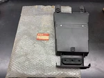 New Rear Storage / Plate Mount 1985 Suzuki GV700GL 35770-07A01. Fixed Price $50.00.