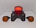 82-83 Honda Urban Express NU50M Oem License Plate Holder Brake Light/turn Signal. Fixed Price $99.88.