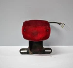 1976 1979 Kawasaki KZ750B Twin Rear Tail Light Assy 23024-066. Fixed Price $21.00.