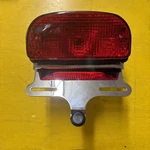 Custom Fat Bob-style Taillight And Chrome Bracket Drag Specialties DS-272021. Fixed Price $100.00.