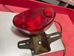 Oem 1972 Kawasaki H-2 Mach Iv 4 Triple H2750 Tailight Bracket. Fixed Price $199.99.