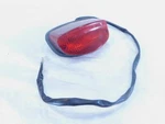 04-07 Honda VT600CD Shadow Rear Tail Brake Light W/ Backplate & Lens. Fixed Price $49.95.