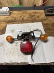 Honda CM200T Twinstar Rear Tail Brake Light License Plate Mount Bracket Blinkers. Fixed Price $43.99.