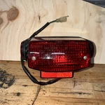 Honda Elite SA50 Rear Brake Light Assembly With Wiring 1988-01 Only. Fixed Price $40.00.