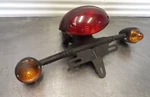 09 Triumph Bonneville Rear Tail Brake Turn Signal Assembly T2700449. Fixed Price $34.94.