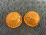 1975 Suzuki RE5 New Old Stock Amber Front Turn Signal Lens 35612-37610. Fixed Price $250.00.
