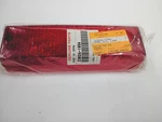 New Old Stock Kawasaki Tail Lamp Lens 23026-1056. Fixed Price $12.00.
