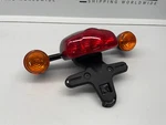Triumph Thruxton 1200 Rear Light W/ Bracket And Blinkers T2702050. Fixed Price $176.91.