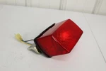 1986 1990 Yamaha Radian YX600 Tail Light Assembly 1UJ-84710-A0-00 86/2. Fixed Price $14.00.