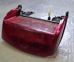 Honda CBR600F2 / F3 Taillight Assembly 33708-MV9-601 And Bracket 77211-MV9-000. Fixed Price $49.97.