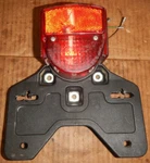 Honda Express NC50 1977-1983 Tail Light & Plate Holder 33700-147-671 H12. Fixed Price $125.00.