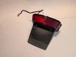 1985 Honda Elite CH250 Tail Light Assembly Oem 33701-KM1-671. Fixed Price $48.00.