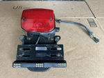 1999 Bmw Rear Tail Light And Plate Mount Run Assembly. Fixed Price $55.00.