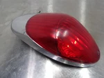 06-25 Kawasaki Vulcan VN900C Rear Brake Light Tail 23025-0032. Fixed Price $23.25.