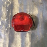 Kawasaki 79 - 81 Rear Back Tail Light Lens. Fixed Price $69.99.