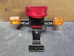 Honda Ruckus NPS50 Oem Tail Light Bracket Blinker Assembly #B368. Fixed Price $49.00.