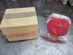 Nos 23024-044 Kawasaki G4TR KV100 Tail Lamp Assembly. Fixed Price $125.00.
