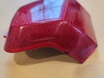 1984 Honda Aero NH80 And NH125 Right Rear Dummy Reflector Lens 33711-GC8-671. Fixed Price $15.00.