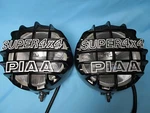 Piaa 200 Fog Lamp Set Black Body W/ Harness H3 12V Tested Ok. Fixed Price $338.50.