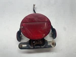 1972-1975 Kawasaki G5-C Rear Tail Light Mount Bracket Lamp Lens Reflctors. Fixed Price $75.00.