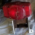 72 73 74 76 CB750 Taillight Rear Brake 33701-341-671. Fixed Price $8.00.