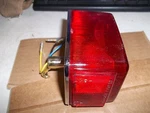 Yamaha XS1100 New Tailight Unit Assy 2J2-84710-60-00. Fixed Price $49.95.